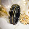 Moroni fekete kerámia karikagyűrű aranyozott 62-es