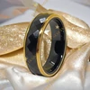 Malabo fekete kerámia karikagyűrű aranyozott 57-es